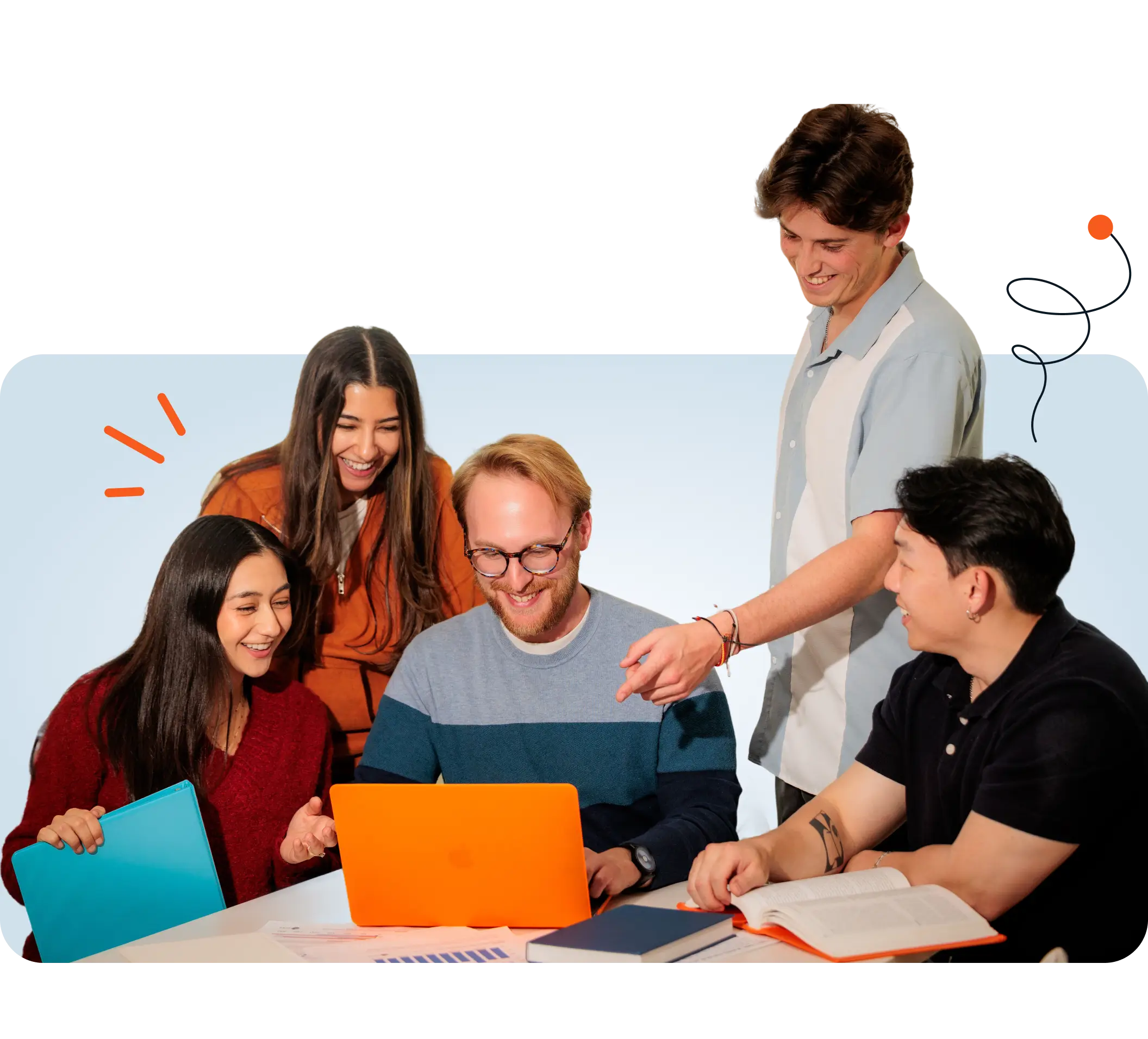students looking at laptop together