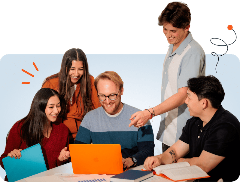 students looking at laptop together
