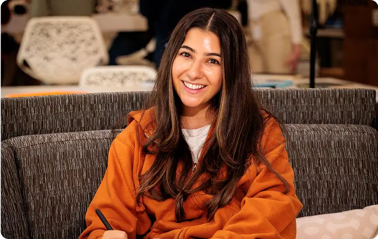 cheerful student wearing orange