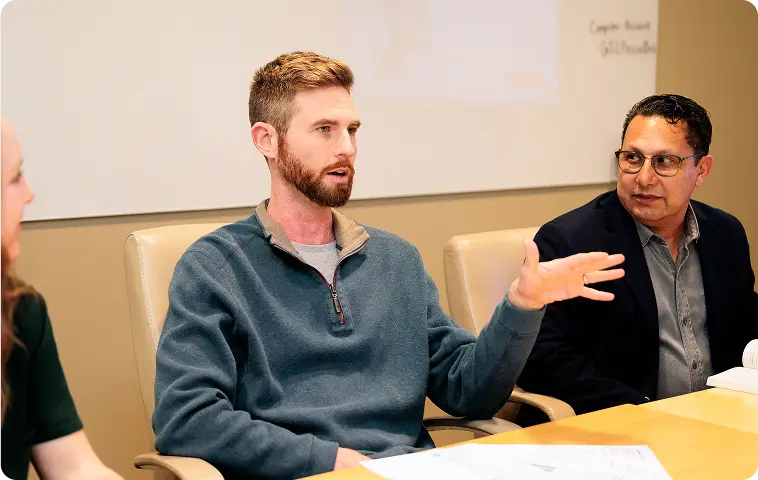college students discussing ideas