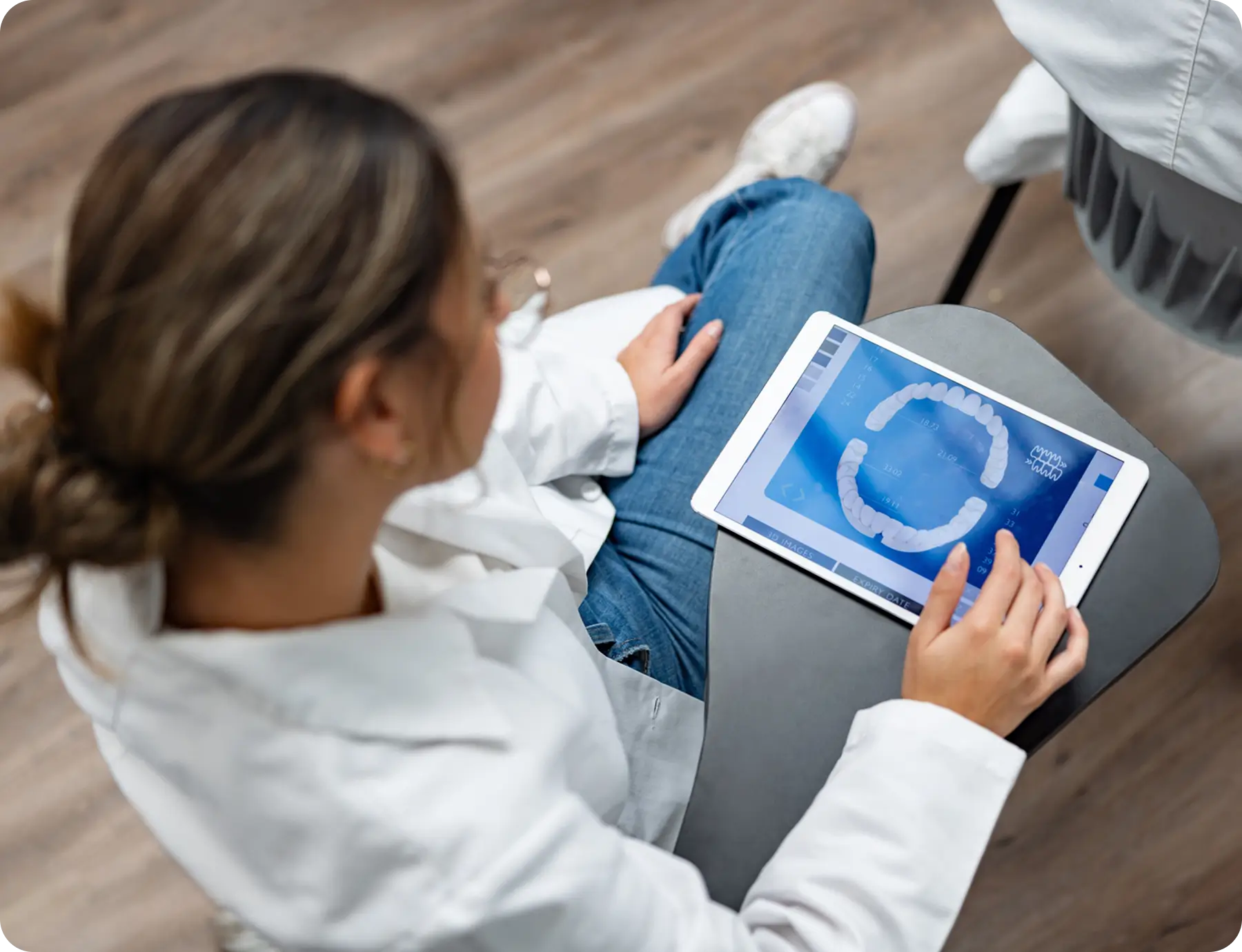 dentist working on ipad