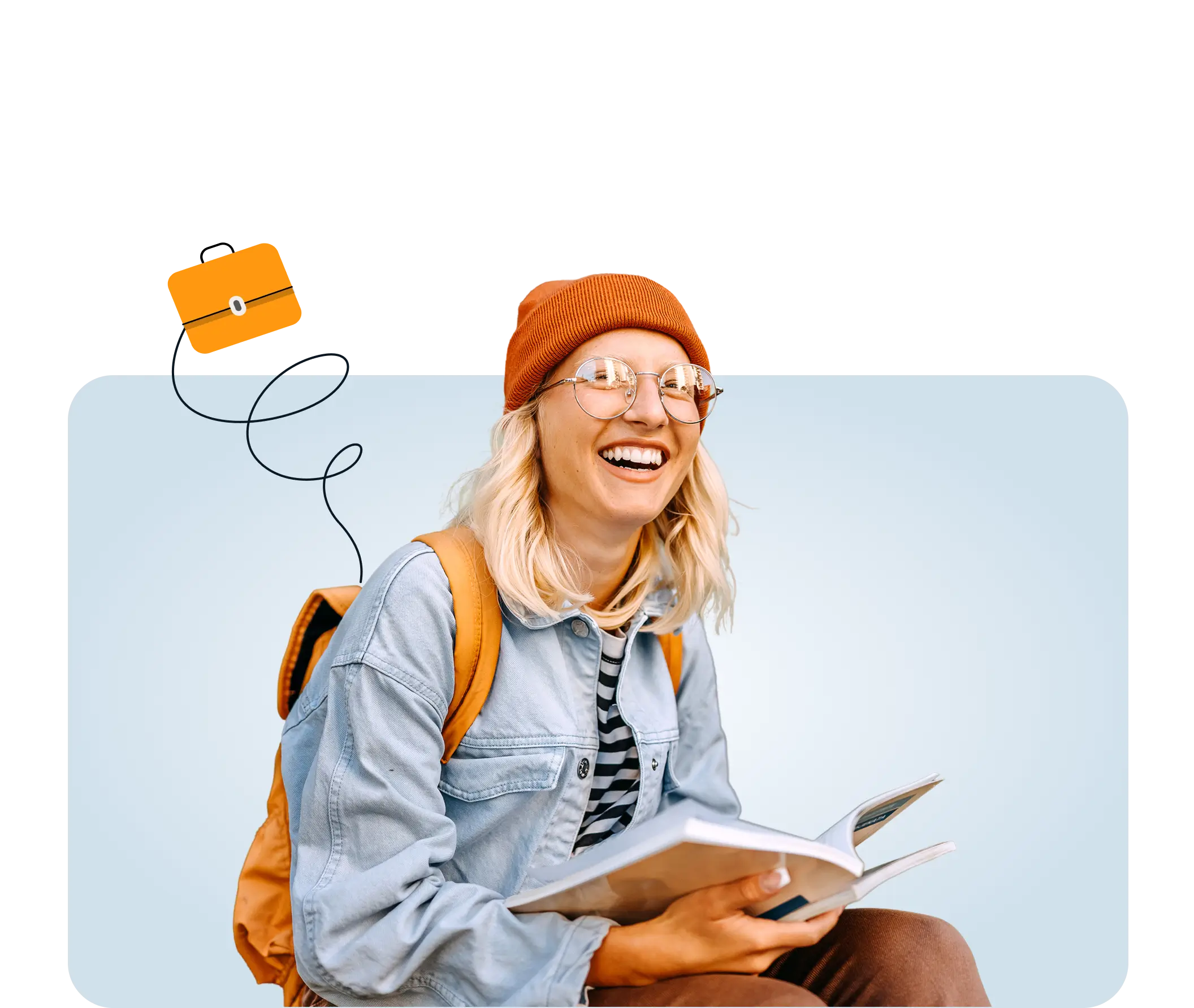 Female student smiling with a book