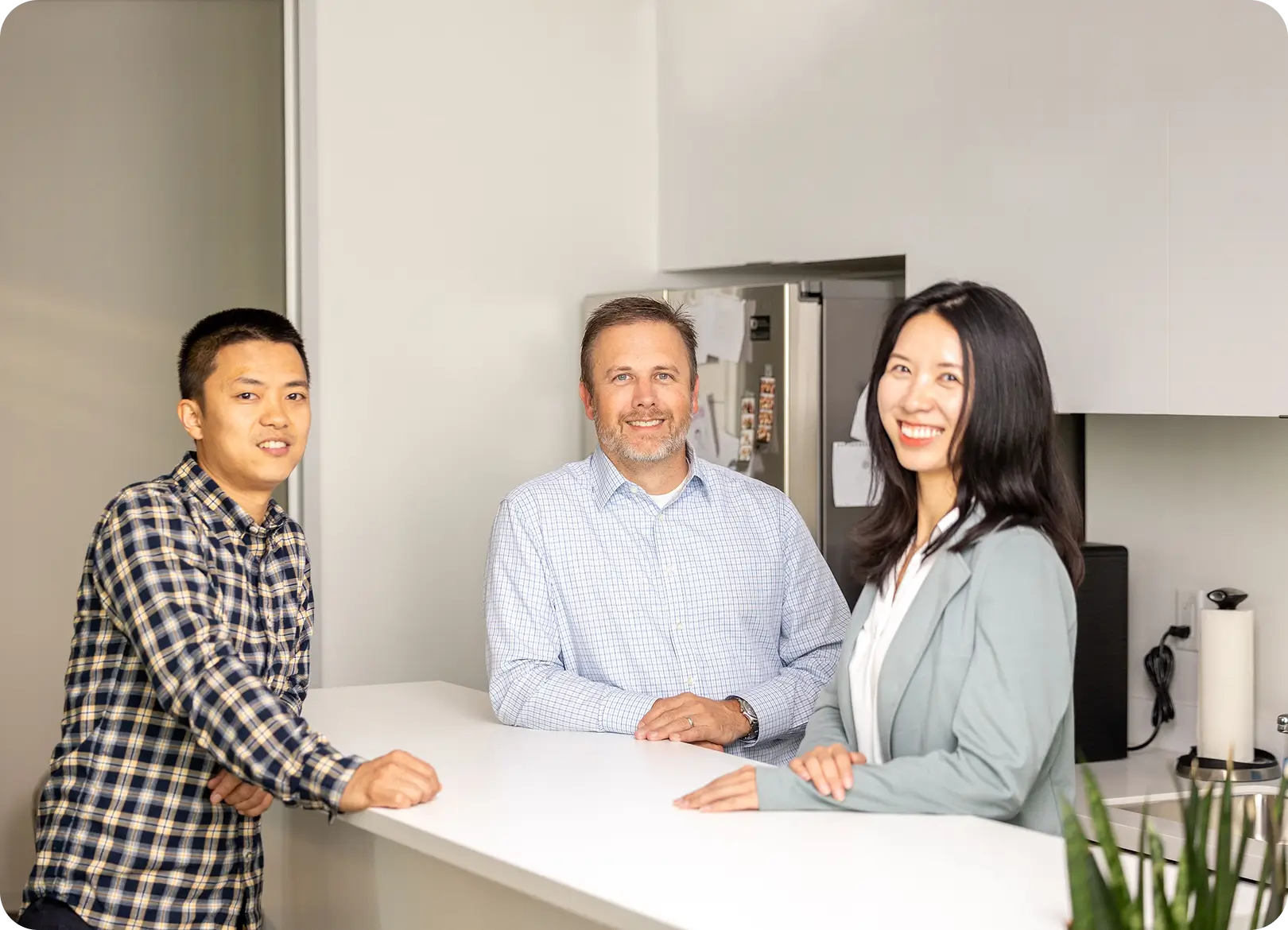 Ryan Gray with colleagues at the office