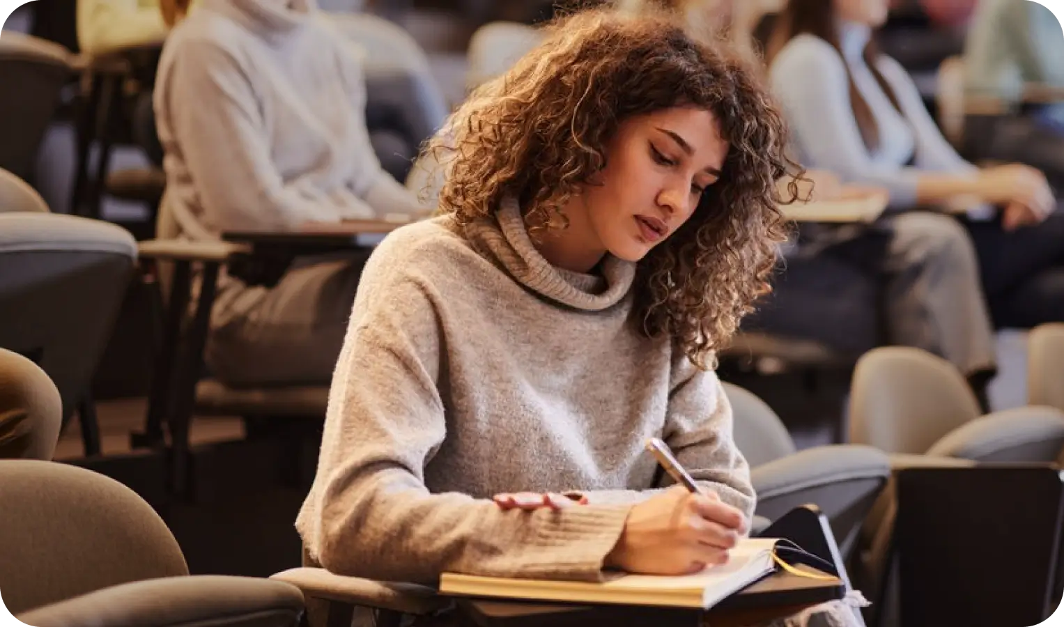 Graduation celebration: A girl concentrating on her studies