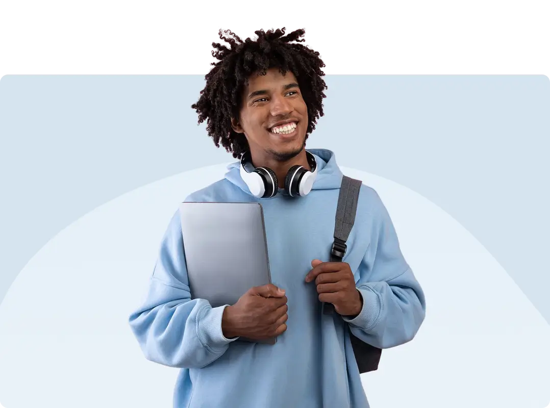 smiling graduate student with laptop