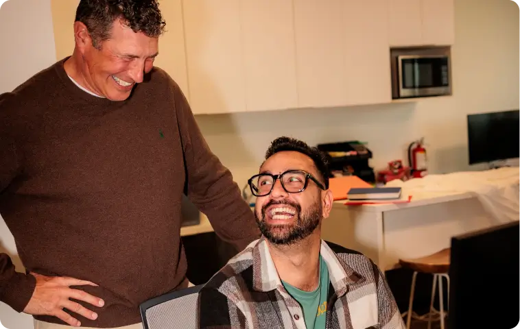 happy colleagues laughing together