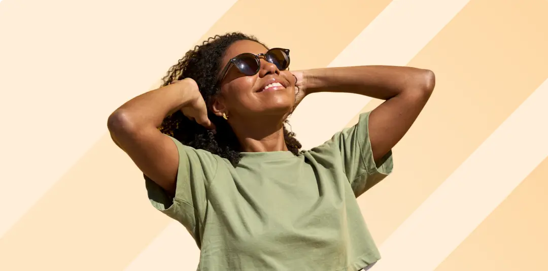 happy woman smiling in the sun