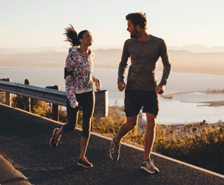 A woman and a man running