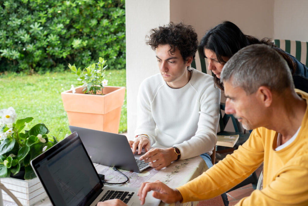 Student and parent sitting in front of computer.