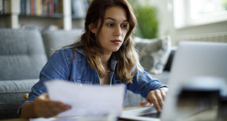 Student looking at piece of paper