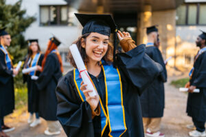 A student graduating and discovering how to find and win scholarships in 2026. Tips, strategies, and resources for students to make college more affordable and land awards that fit their goals.