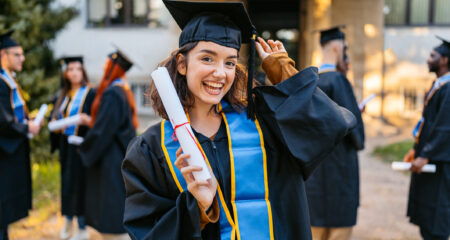 A student graduating and discovering how to find and win scholarships in 2026. Tips, strategies, and resources for students to make college more affordable and land awards that fit their goals.