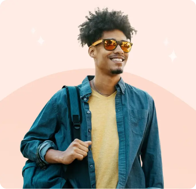 College student with backpack smiling - desktop